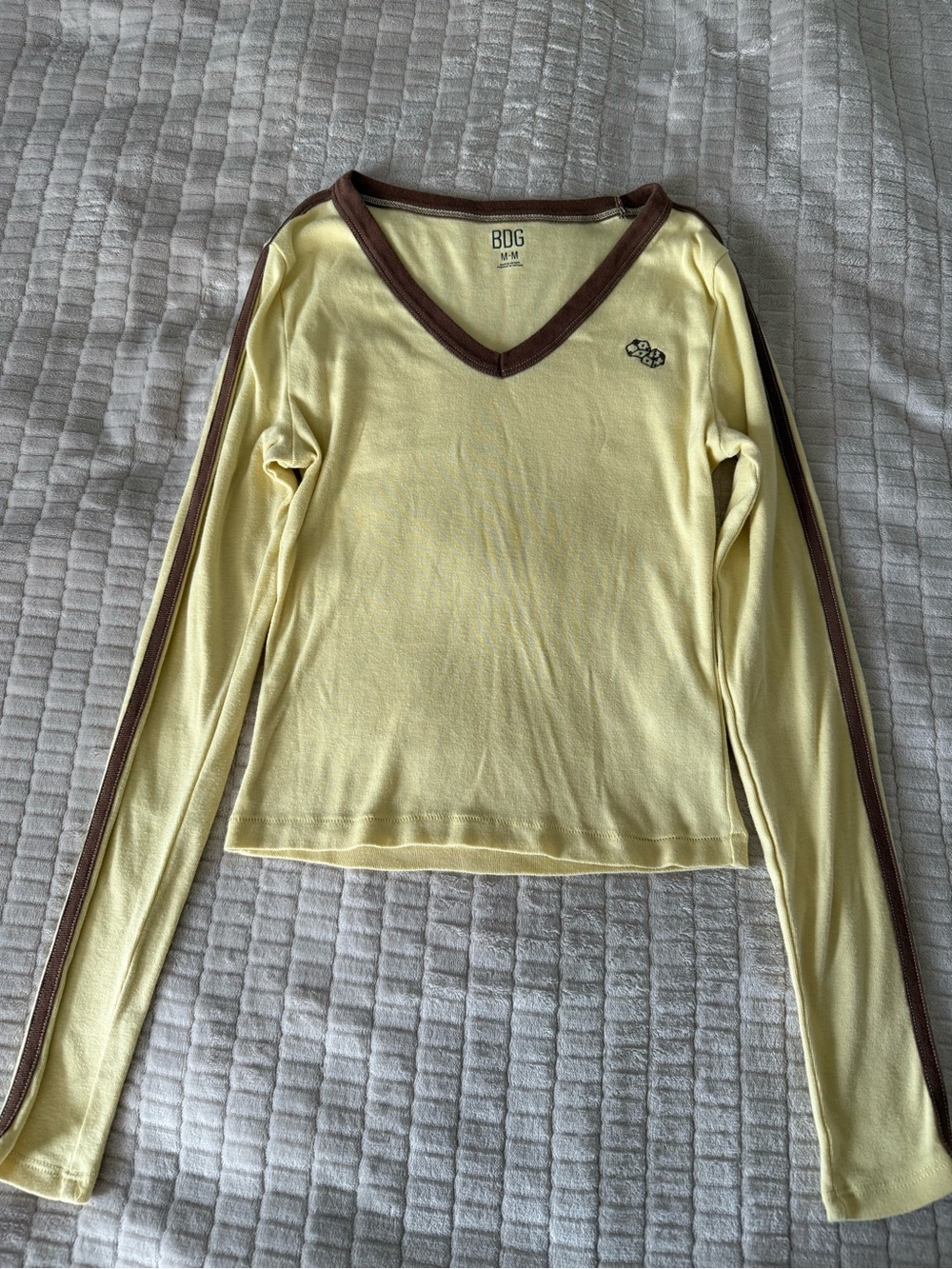 BDG Pale Yellow V‑Neck Cropped Long Sleeve Top with Brown Trim